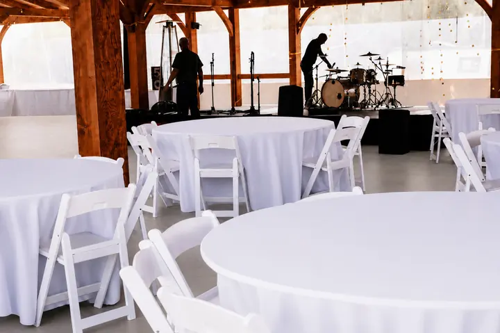 Reception tables set in front of the band stage